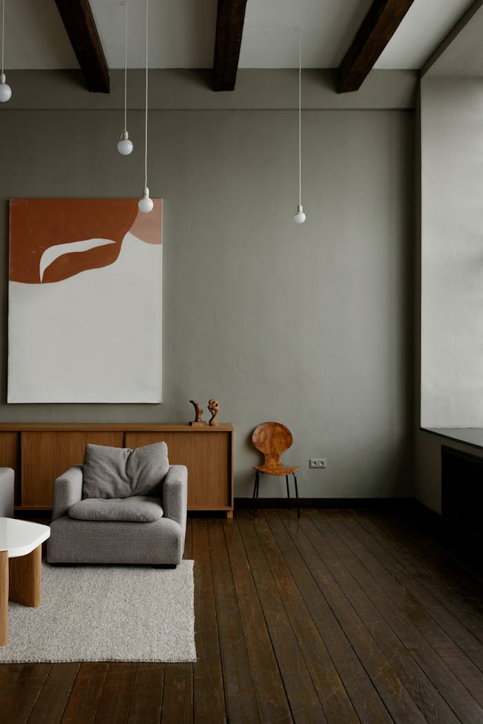 services-04 Stylish minimalist living room with modern furniture and neutral tones.